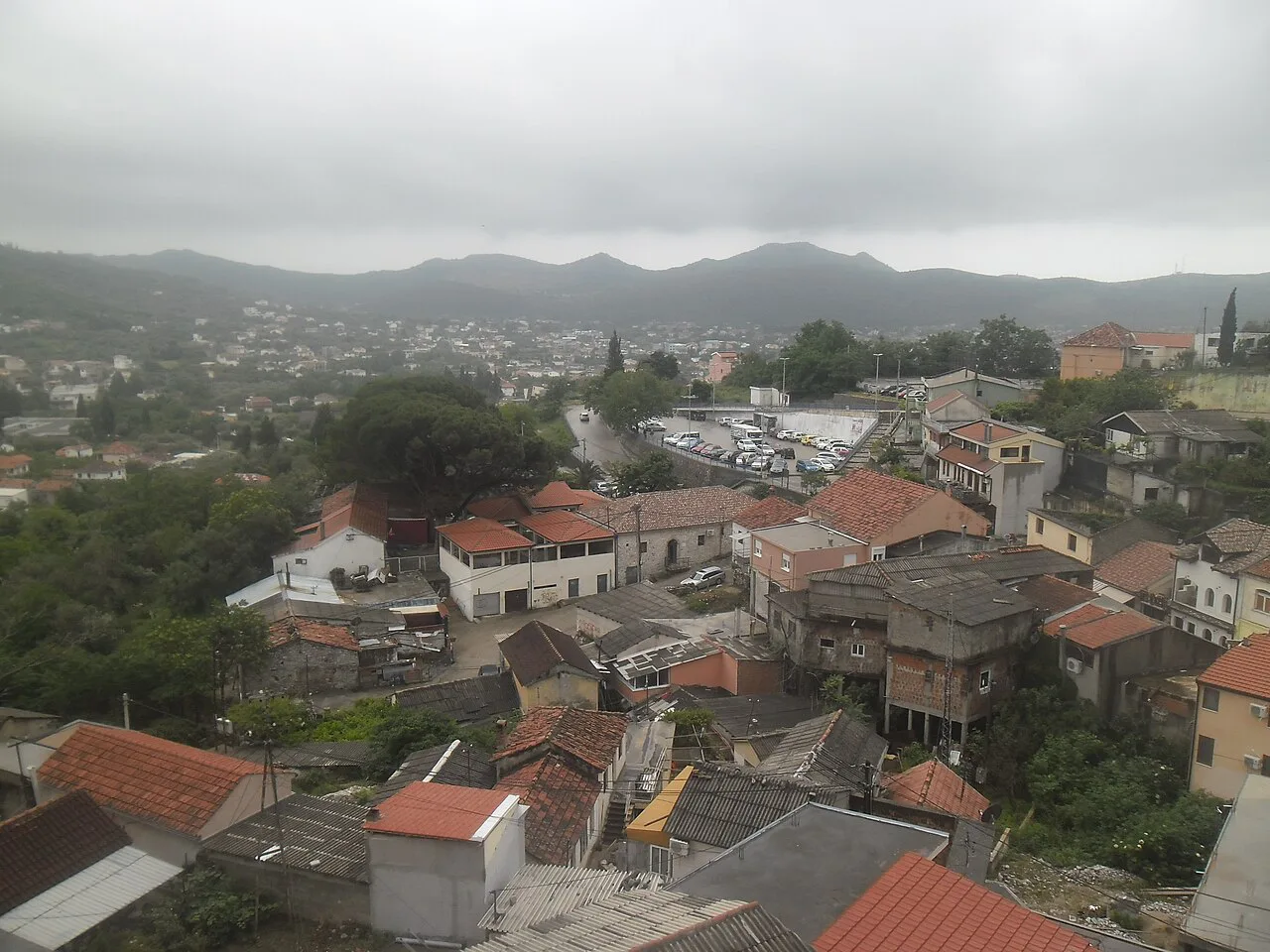 Rooftops of Bar below the mountains.