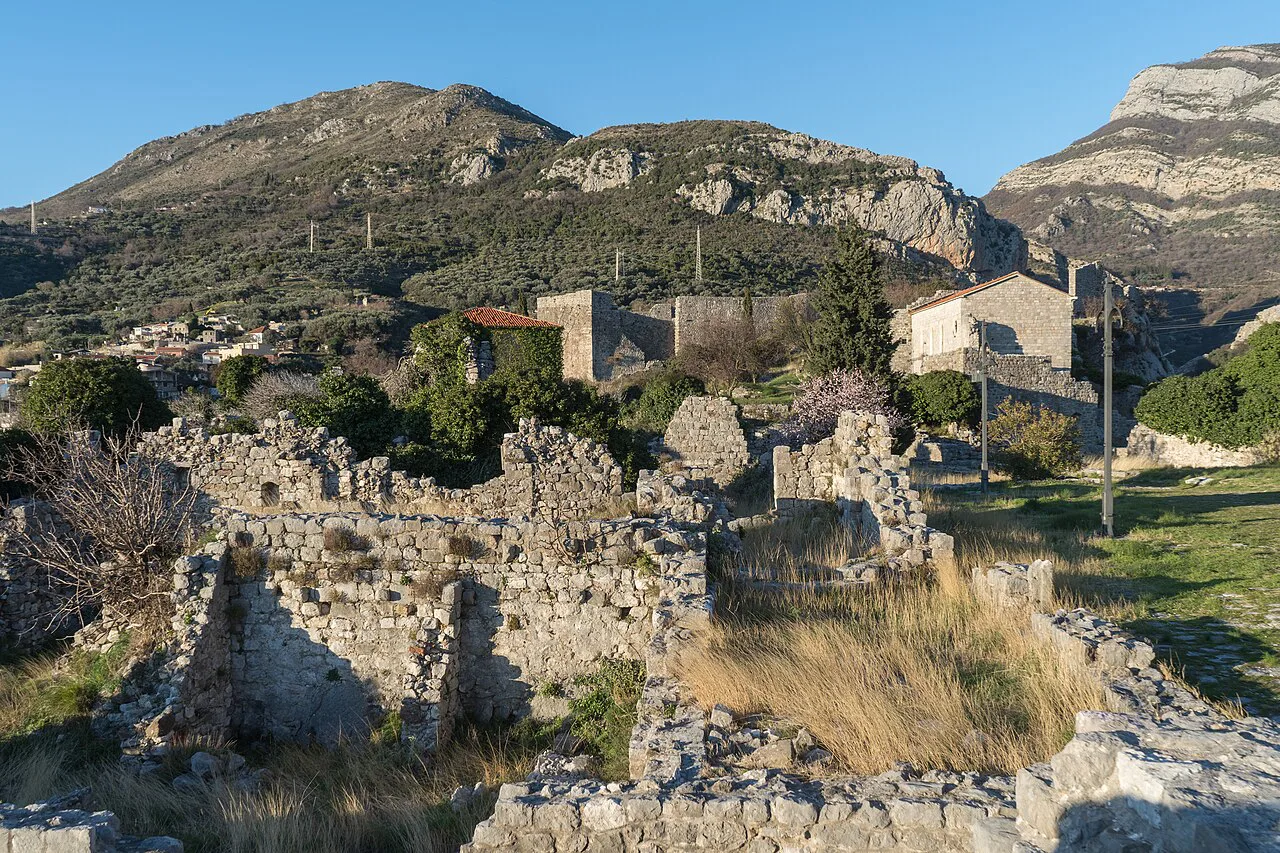 Ruined walls of Stari Bar beneath the surrounding mountains.