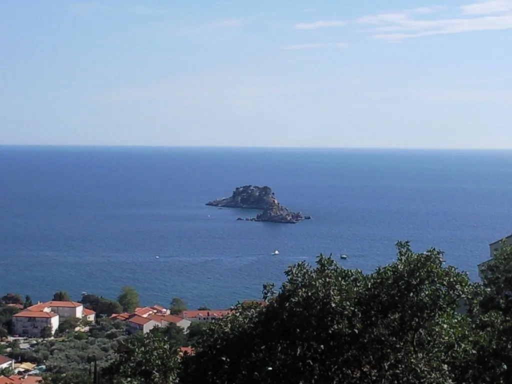 The sea and a rocky islet off Petrovac.