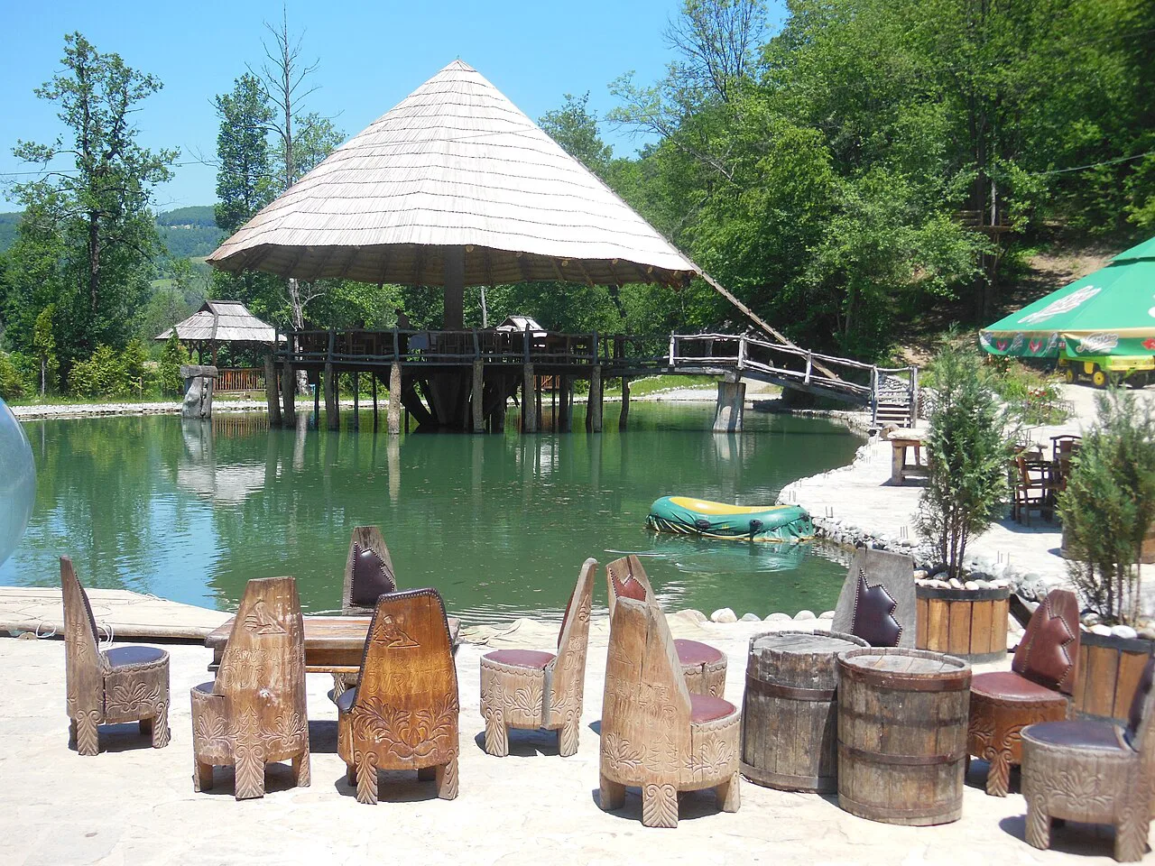 The pond and wooden gazebo at Etno selo Vuković near Bijelo Polje.