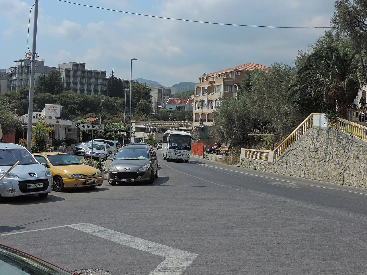 Road and parked cars in Rafailovići, east of Budva