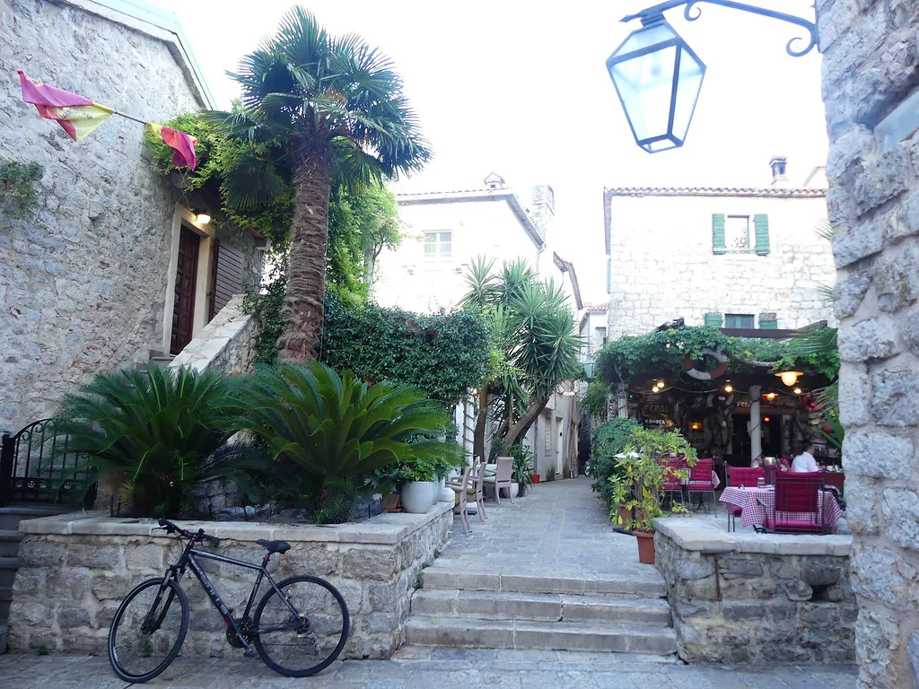 A café-lined lane in Budva Old Town.