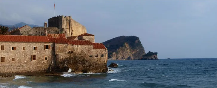 Budva's old citadel with St Nicholas Island beyond.