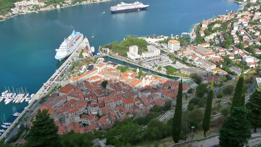 Kotor Old Town's rooftops and the bay seen from above.