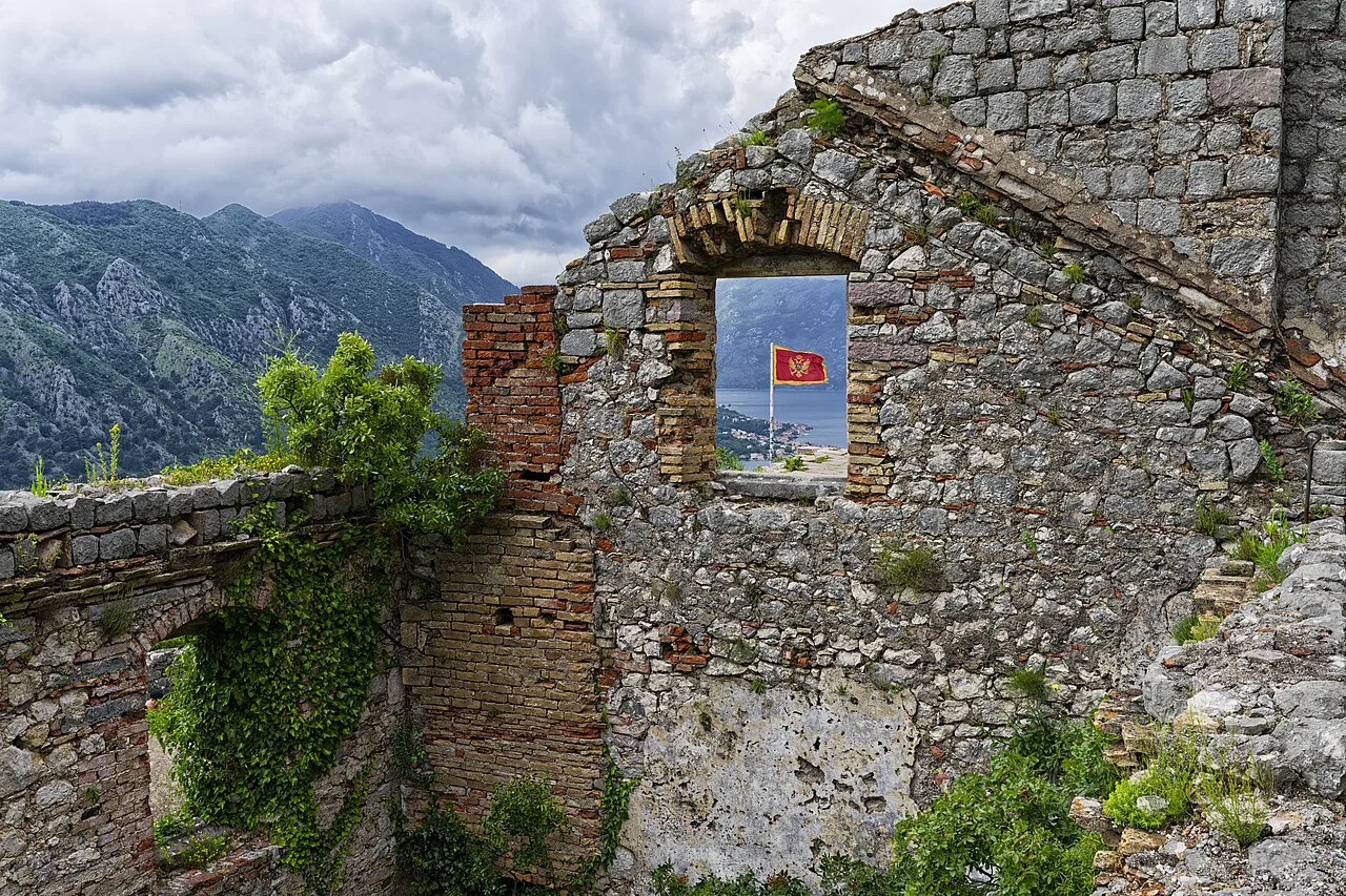 Ruined stone walls of the fortifications above Kotor Old Town.