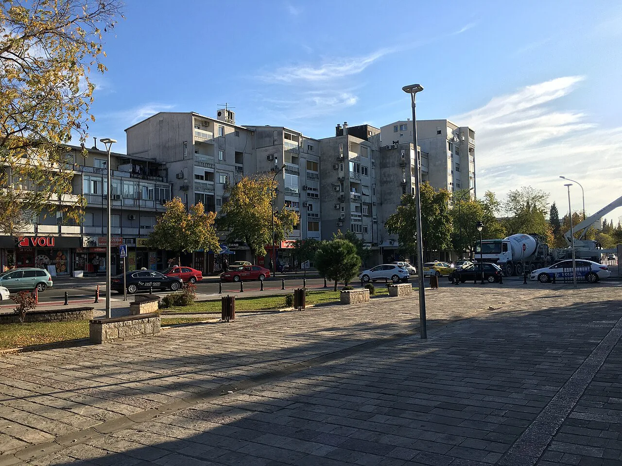 A paved square and apartment blocks in Podgorica.