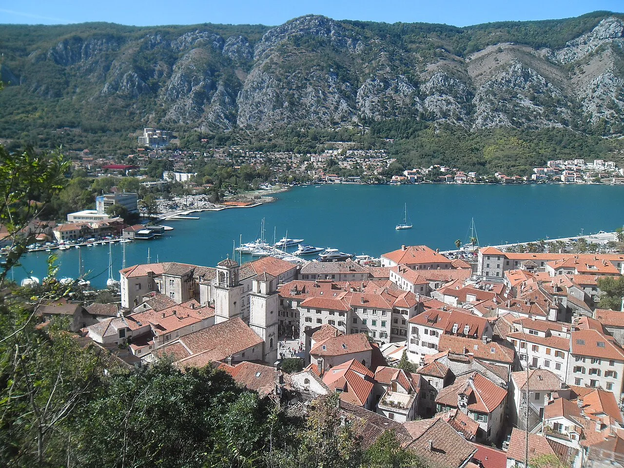 The rooftops of Kotor Old Town and the bay seen from above.