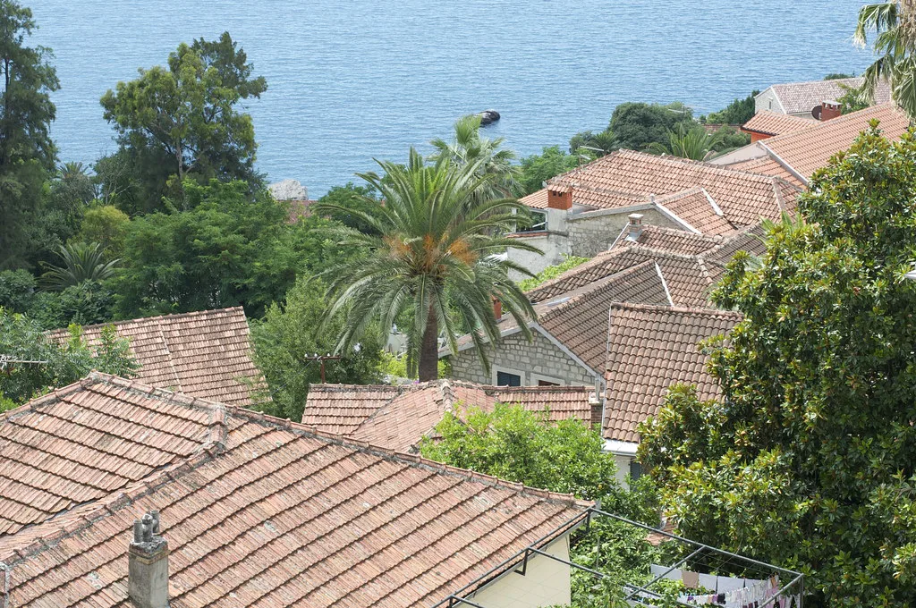 Terracotta rooftops of Herceg Novi above the sea.