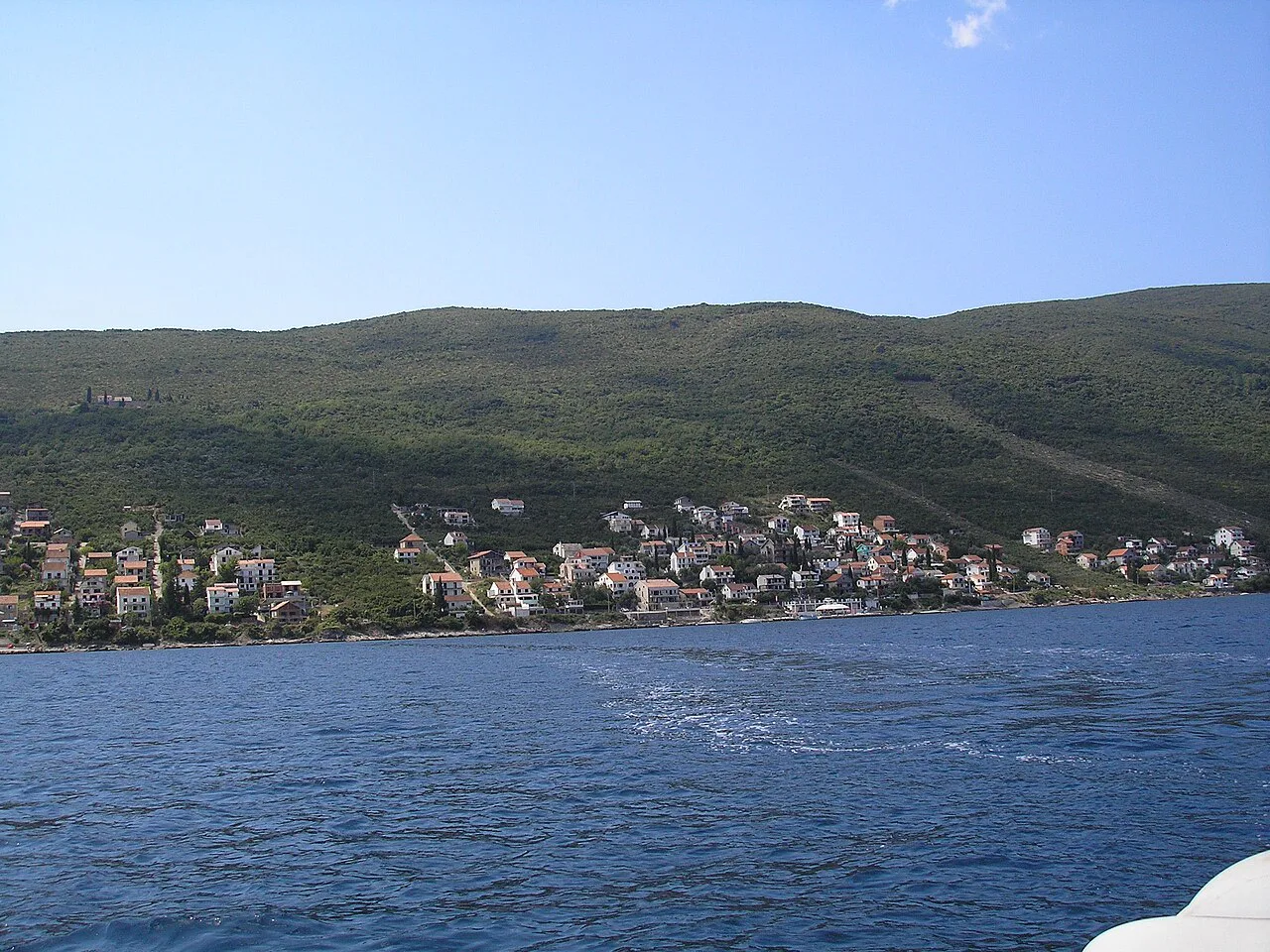 Krašići seen from the water, Montenegro.