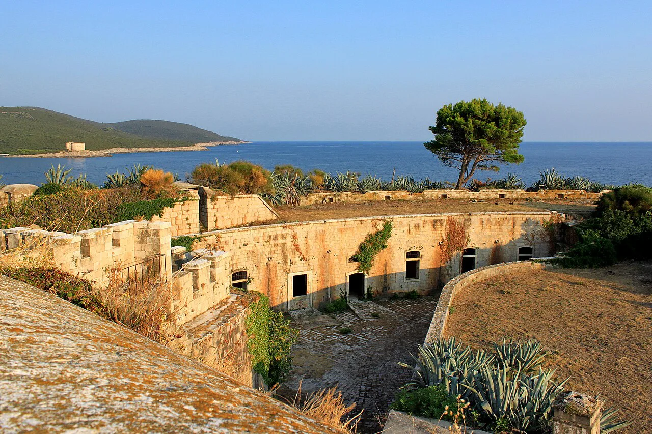 The fortress walls on Mamula island, with the open sea beyond.