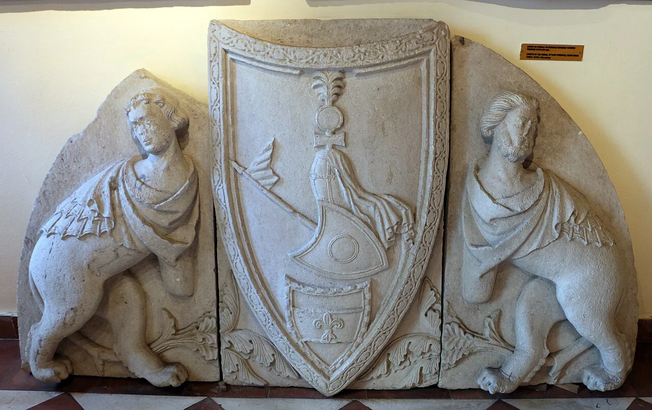 A 14th-century carved lunette from a palace portal, displayed at the Maritime Museum of Montenegro in Kotor.