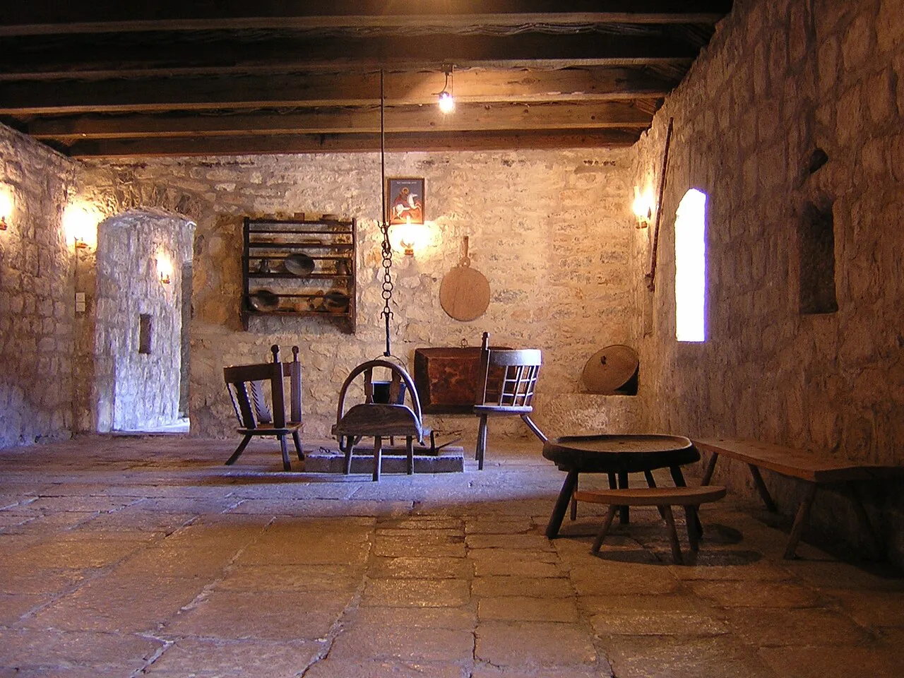 Interior of an old stone house in Njeguši, the village known for its cheese and pršut