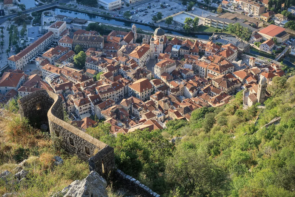 Kotor Old Town and its fortifications seen from the walls above.
