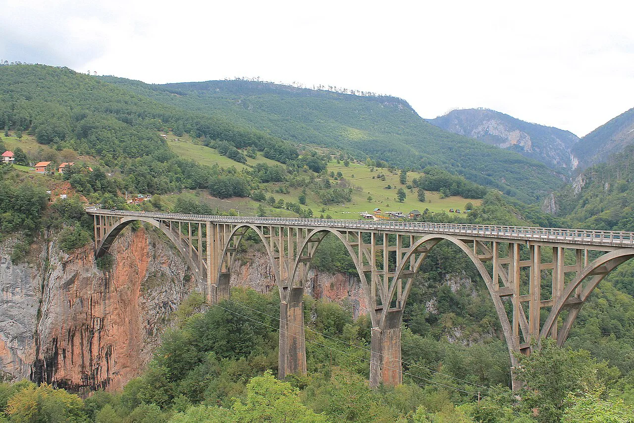 The arches of the Đurđevića Tara Bridge over the canyon.