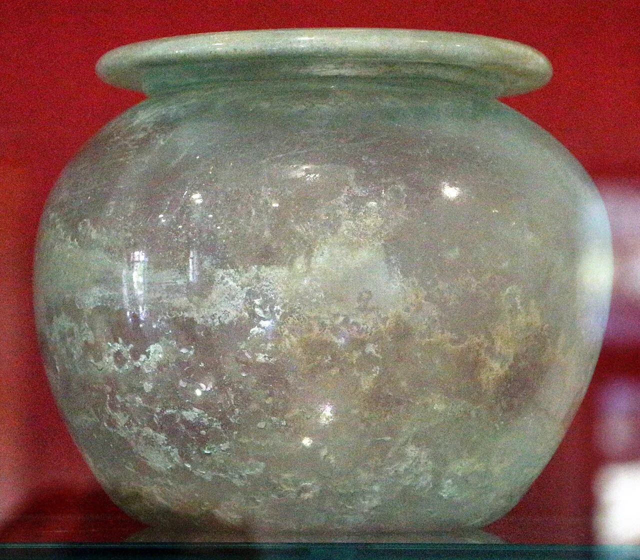 Roman glass vessel from the Doclea necropolis, on display at the National Museum in Podgorica.
