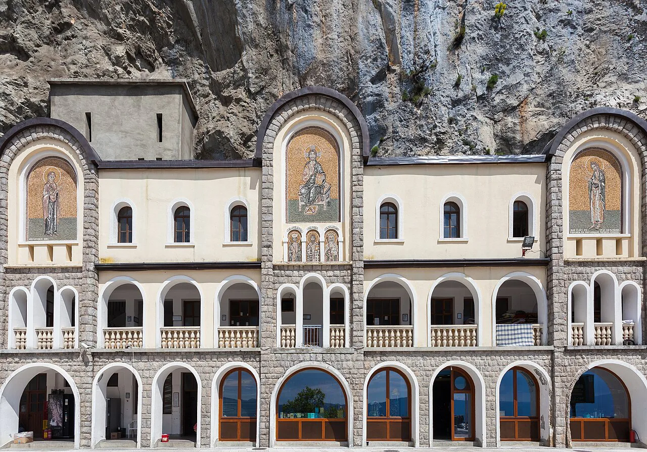 The upper church of Ostrog Monastery set against the rock.