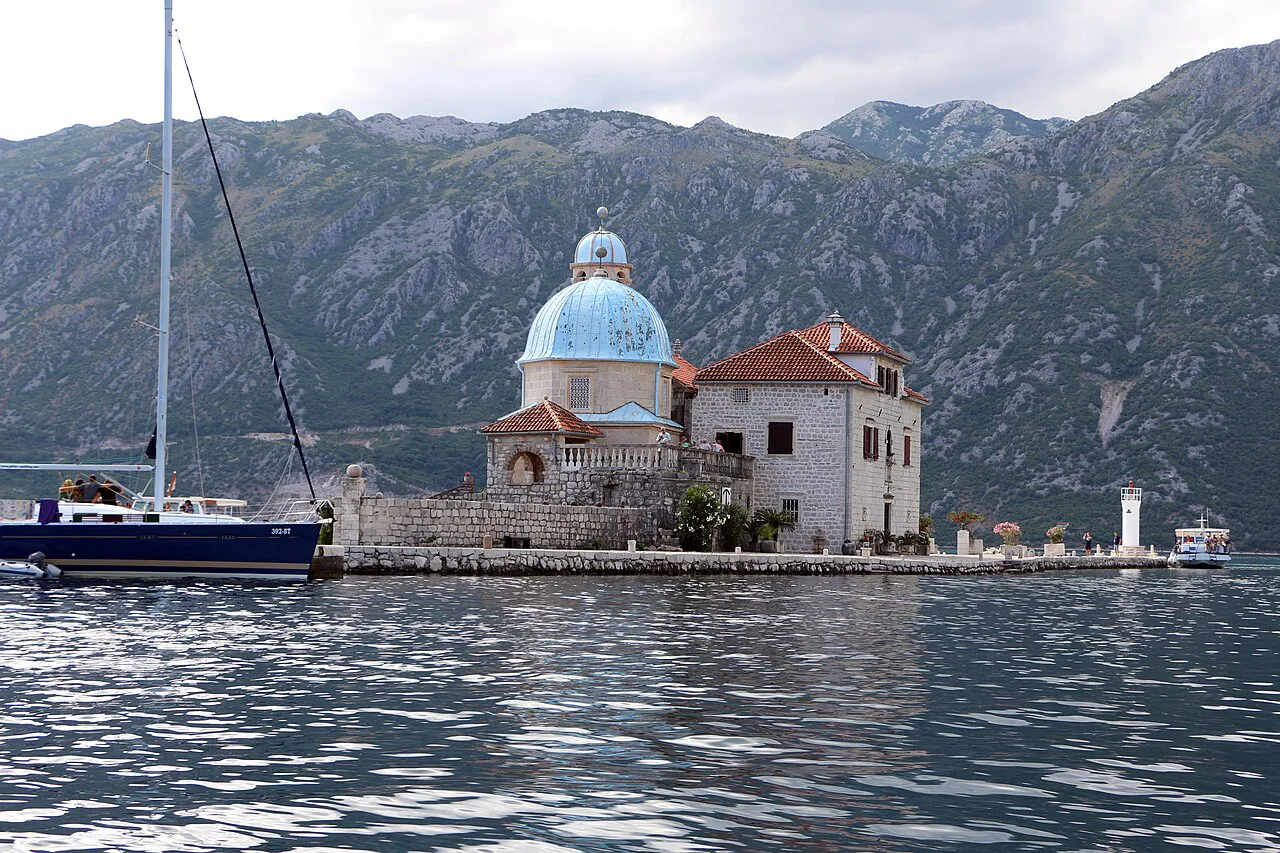Our Lady of the Rocks islet seen from the water off Perast.