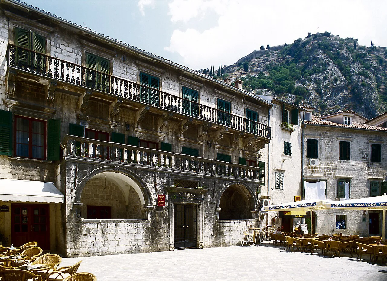 Pima Palace with its long balcony on Trg od oružja (formerly Trg oslobođenja), Kotor.