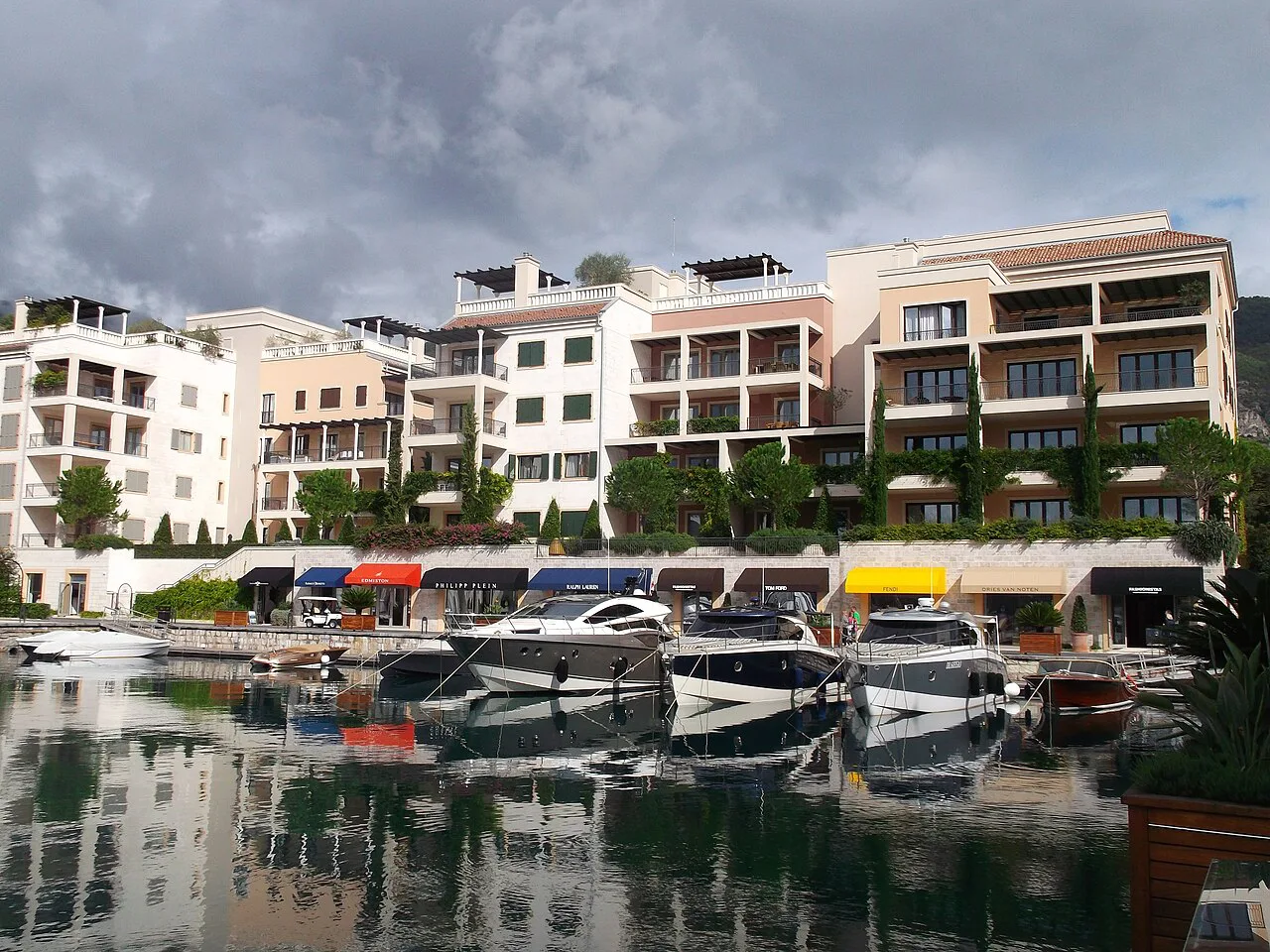Yachts moored in front of residences at Porto Montenegro.