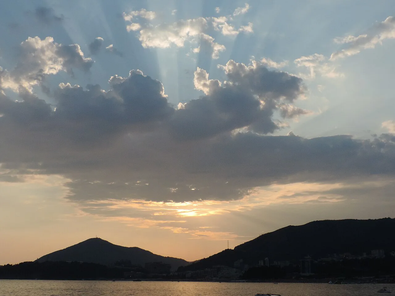 Sunset over the sea and headlands seen from Rafailovići.