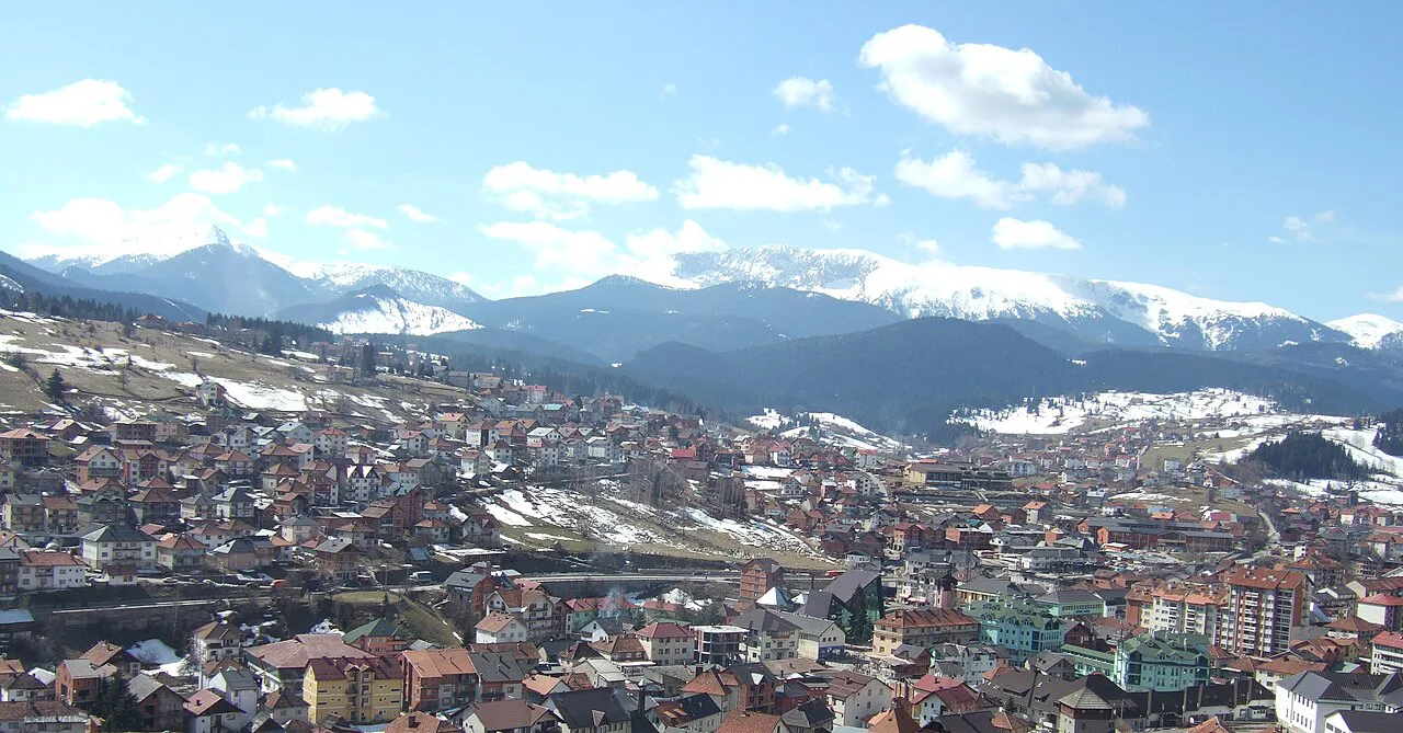 Rožaje in early spring, with snow on the mountains beyond the town.