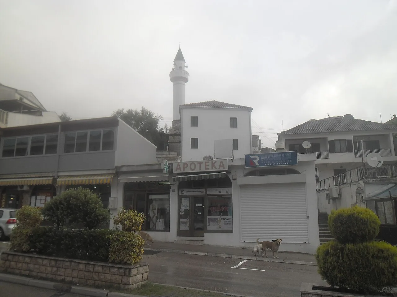 A mosque minaret above a street in Ulcinj.