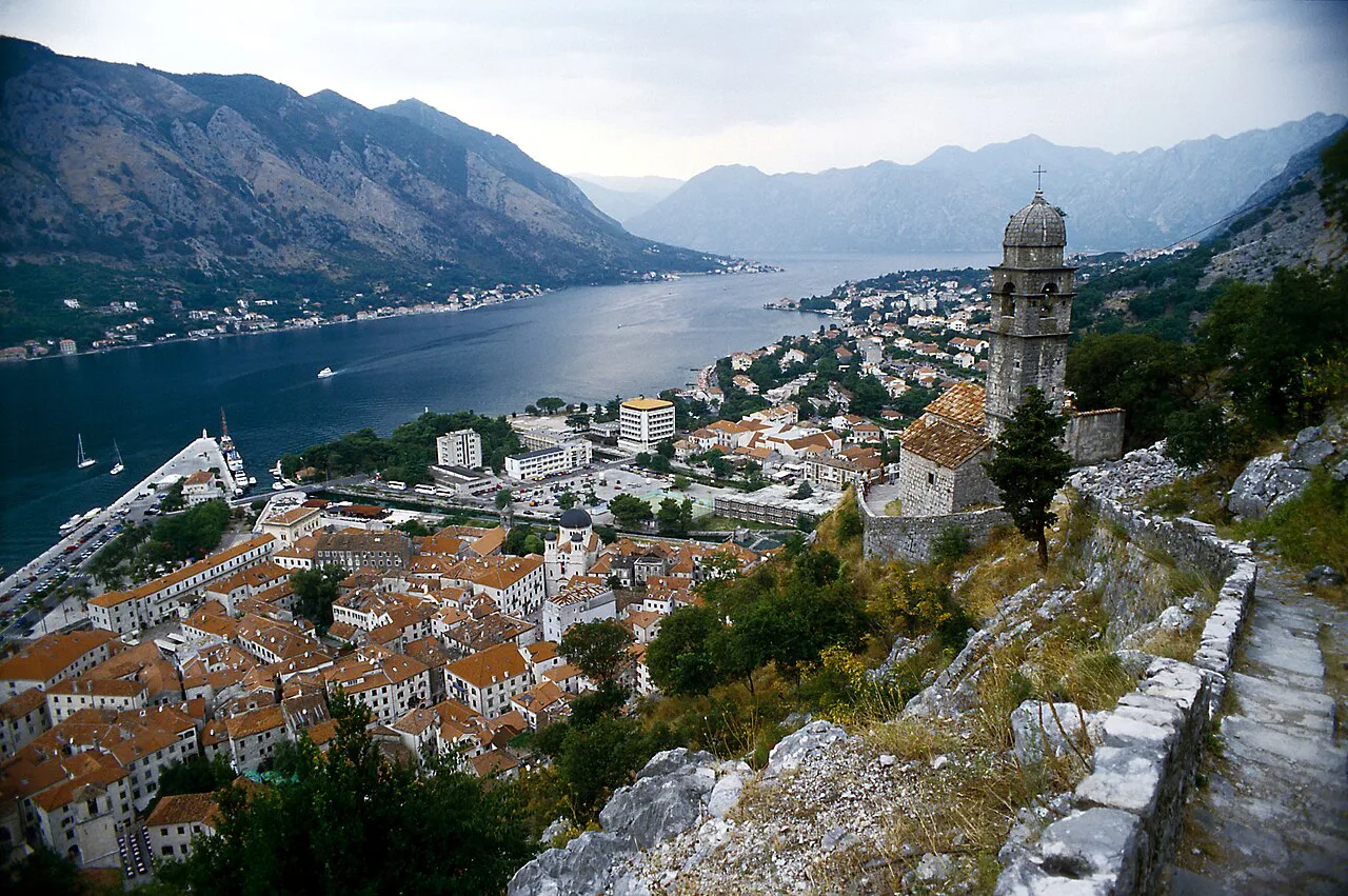 Kotor Old Town and the bay, with the Church of Our Lady of Health on the hillside.