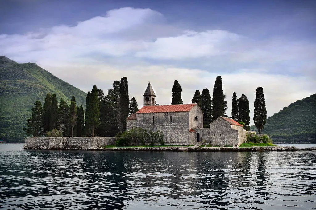 Venue view: St George Island with its church and trees, Perast Resized and converted to WebP.