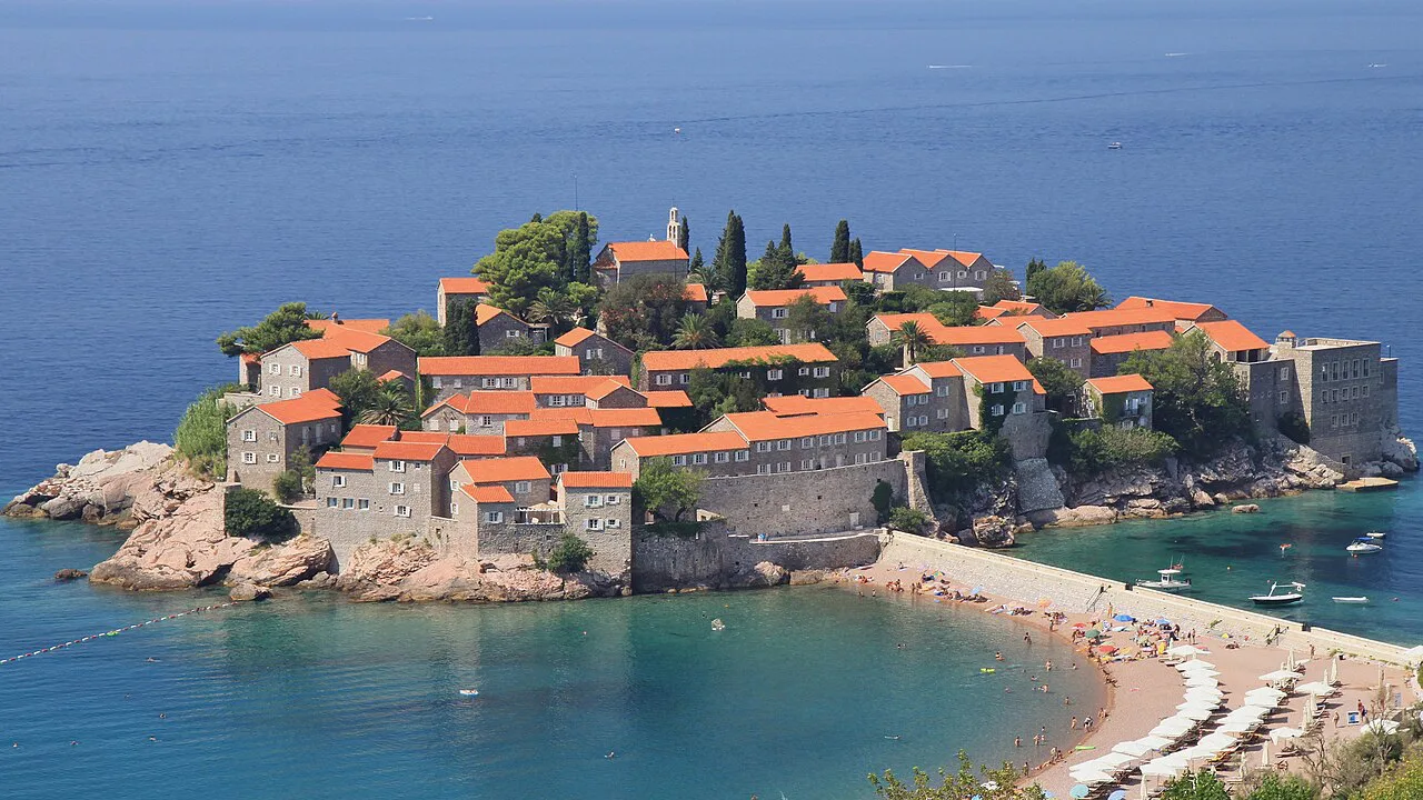 Sveti Stefan seen from the hillside above the coast.