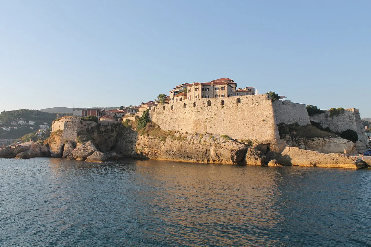 The fortified walls of Ulcinj Old Town above the sea.