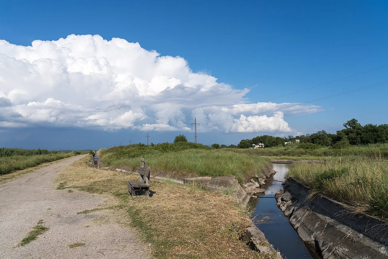 A channel and path through Ulcinj Salina.
