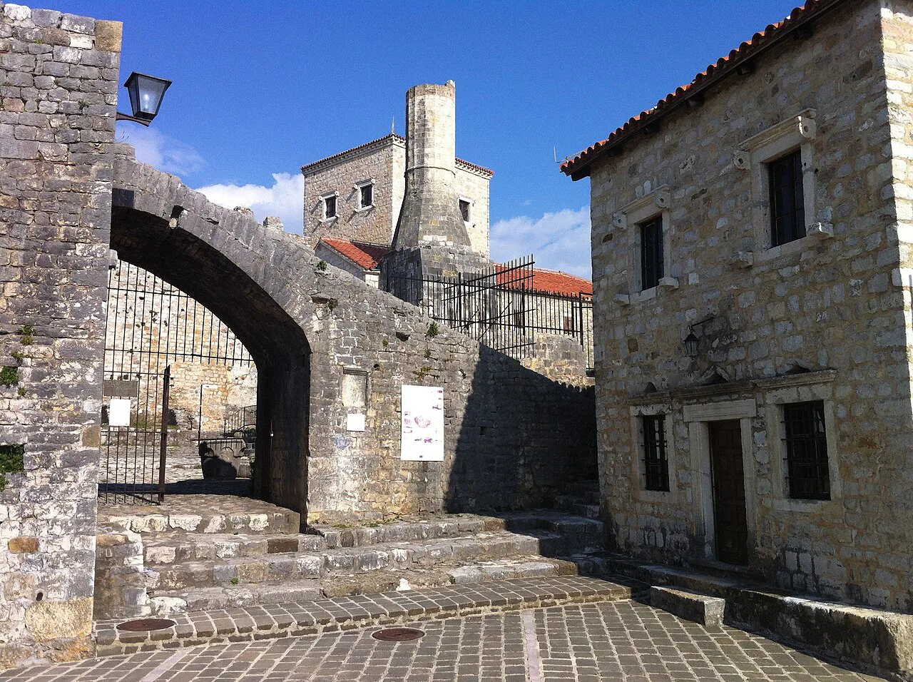 A stone archway and lane inside Ulcinj Old Town.