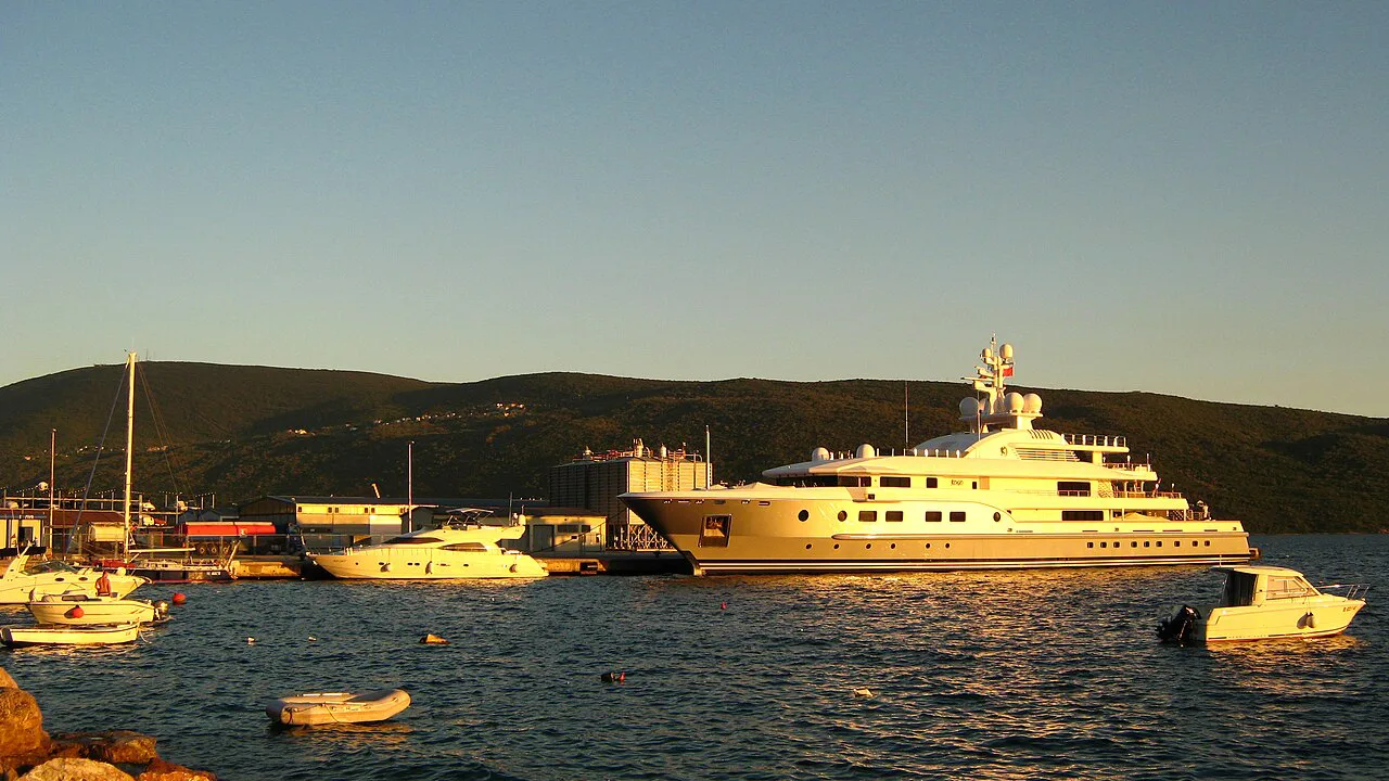Yachts moored in the port of Zelenika at sunset.